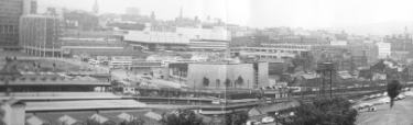 View of (foreground) Sheffield Midland railway station showing (left) Sheffield Polytechnic and Pond Street Bus Station and (centre) Sheaf Valley swimming baths and the Fiesta nightclub