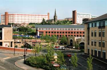 View from Derek Dooley Way showing (right) entrance to Victoria Quays car park, (centre) Navigation House. (back right) Harold Lambert Court (formerly Hyde Park Flats) and (back left) Castle Court (formerly Hyde Park Flats