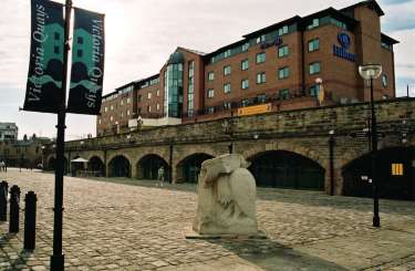 Victoria Quays showing Hilton Hotel and the Heron and Fish sculpture by Vega Bermejo