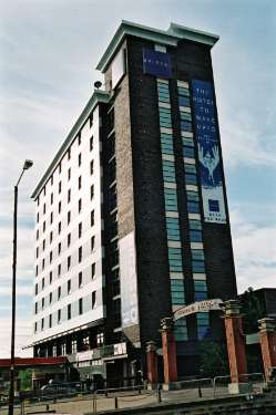 Hotel Bristol, Blonk Street showing (foreground) entrance arch to the Royal Victoria Holiday Inn, Victoria Station Road