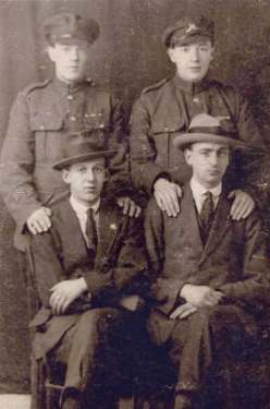 Ernest Duncum (seated left front row) in probable family group