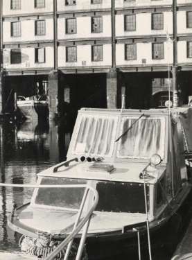 Boat in the Canal Basin, Sheffield and South Yorkshire Navigation showing (back) the Straddle Warehouse