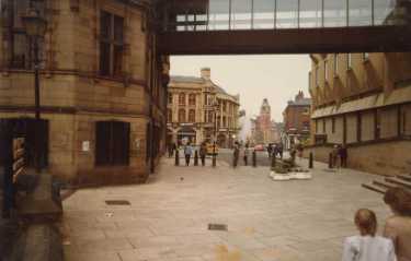 Norfolk Street looking towards Surrey Street showing (left) Town Hall, (right) Town Hall extension (known as the Eggbox) and (top) link bridge between the two buildings