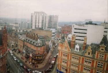 Pinstone Street (bottom left) at junction of (centre) Cross Burgess Street showing (top left) Grosvenor House Hotel and (top centre) Telephone House