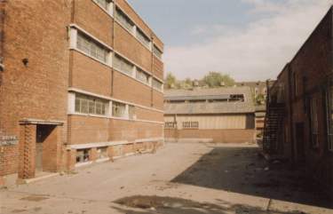 Unidentified building on Archer Road looking towards (centre) Sheffield and Ecclesall Cooperative Society's milk float maintenance depot