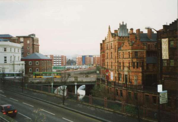 View of (foreground) Castlegate showing (left) Exchange Brewery, (centre) Lady's Bridge and (right) Royal Victoria Buildings
