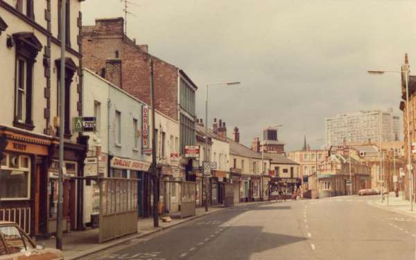 Shops on West Street showing (left) Nos. 159 - 161 Darlows Ltd., sport supplies and (centre right) Royal Hallamshire Hospital