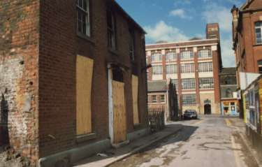 Carver Lane looking towards Cooperative Wholesale Society Ltd., jeans and overall factory, Nos. 70 - 82 West Street