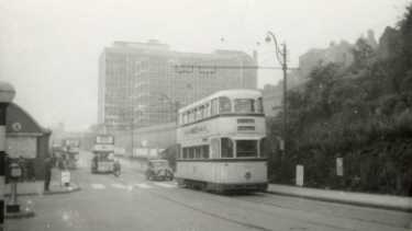 Tram 512 on Pond Street showing (left) Pond Street Bus Station and (centre back) Sheffield College of Technology
