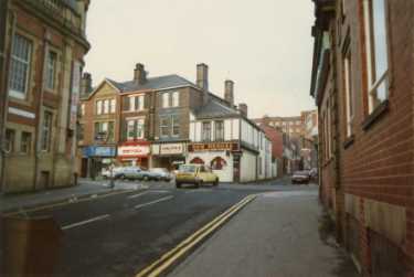 Glossop Road from Cavendish Street showing (l. to r.) No. 276 Oxfam charity shop; No. 274 unidentified pizza restaurant, No. 272 Halifax Building Society and No. 270 New Bengal, Indian restaurant