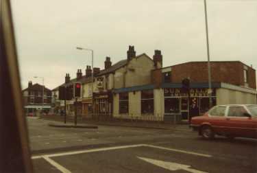 Attercliffe Road showing (left) No. 563 Carlton public house and No. 565 Sun Valley Amusements