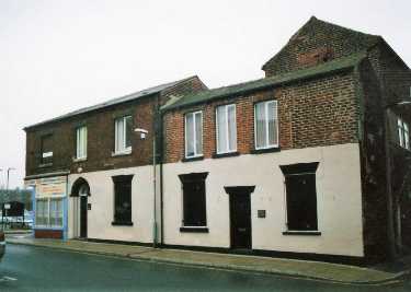 Arundel Street showing (left) Nibblers (latterly Wellie's), sandwich shop, No. 140 Charles Street 