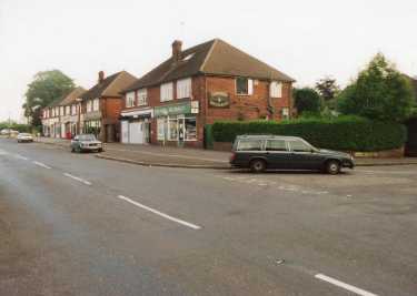 Shops on Twentywell Lane at junction with (right) Kenwell Drive showing (centre) No. 298 Bradway Pharmacy