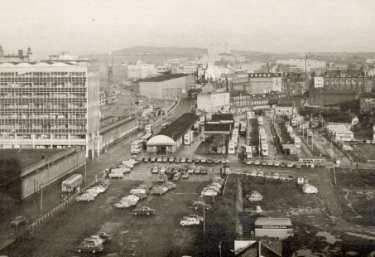 View from probably Sheaf House of (left) the College of Technology (later Sheffield Polytechnic) and (centre) Pond Street bus station, c. 1968