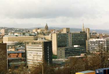 View from Cholera Monument of the City Centre showing (bottom left) Sheaf House, offices, (centre left) Town Hall extension (known as the Eggbox) and (right) Sheffield Polytechnic