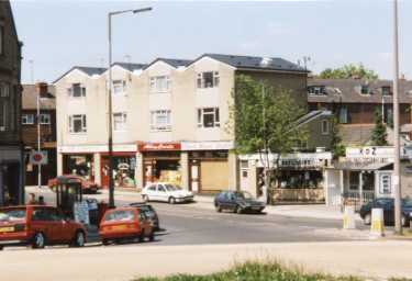 Shops on Abbey Lane near the junction with Meadowhead and Chesterfield Road showing Nos. 14 -16 Homes and Gardens DIY; No. 12a Abbey Cards; No. 12 David Moore Studios and No.2 The Brew Mart, home brewing shop