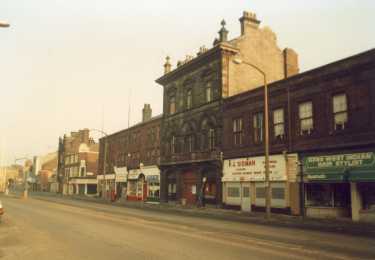 No. 48 SADACCA (Sheffield and District African Caribbean Community Association) (originally Samuel Osborn and Co. offices) and No. 42 P. J. Sisman, electrical store, and Afro-West Indian Hair Sylist