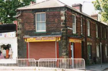 Shoe repairs shop, No. 868 Chesterfield Road at junction with (right) Holmhirst Road  