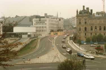 Commercial Street from Park Square roundabout showing (left) Barclays Bank and (right) Canada House (old former Gas Company offices)
