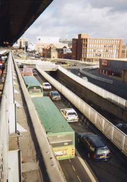 Eyre Street underpass looking towards Furnival Square showing (top right) Arundel House and (right) Office World, stationers and office equipment