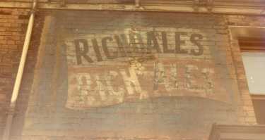 Wall advertisement for 'Richdales Rich Ales' [brewed by] John Richdale and Co. Ltd., Britannia Brewery, Bramall Lane