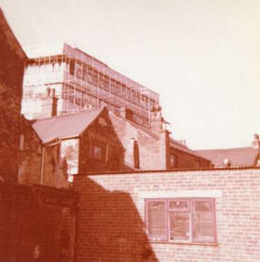 Rear of buildings on Orchard Street, before development of Orchard Square