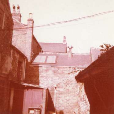 Rear of buildings on Orchard Street, before development of Orchard Square