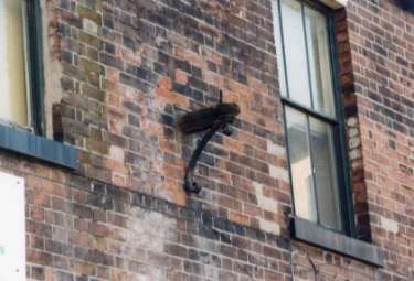 Listed building on the corner of Sudbury Street and Malinda Street showing original gas lamp fitting