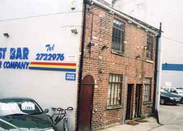 Rear of West Bar Motor Company, No. 119 West Bar