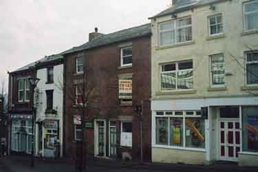 Property on Howard Street showing (l. to r.) No. 46 Harlequin Fish Bar, No. 44 Sabino's, unisex hair salon and Nos. 42 - 36 Howard Street