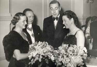 Mr John Gordon Buxton and his wife Mrs Alice Buxton [left] at an event