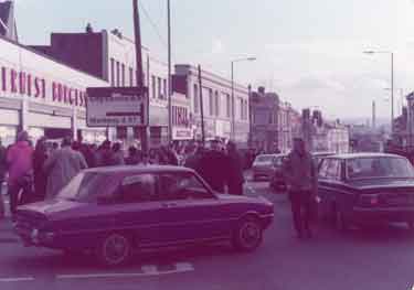 Police and crowds outside Ernest Burgess Ltd., tailors, Nos. 614 - 618 Attercliffe Road