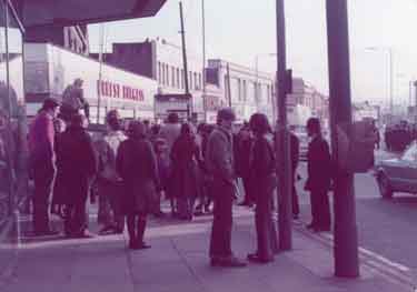 Police and crowds on Attercliffe Road showing (left) Nos. 614 - 618 Ernest Burgess Ltd., tailors