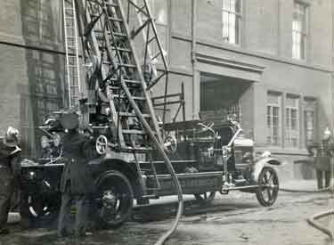 Fire engine with extended ladders outside William Marples and Sons, Hibernia Works, Edge Tool Manufacturers, Westfield Terrace, Division Street