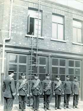Rockingham Street Fire station showing training exercise in life saving using pompier ladders and lines 