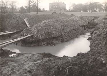 Construction of air raid trenches in Hillsborough Park showing (top) Hillsborough Hall