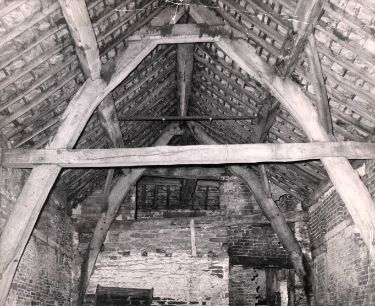 Interior of cruck-built barn with 4 or 5 bays, part of the outbuildings of Norton House, Norton Lane