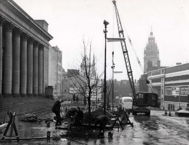 Tree planting in Barkers Pool showing (right) the Gaumont Cinema, (centre) Cinema House and (left) the City Hall