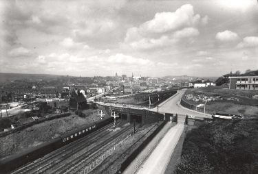 View of Granville Road Railway Bridge leading down to the junction with Suffolk Road showing (centre) Granville Street