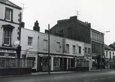 Shops on West Street showing (l.to r.) No. 155 Foto Fare, photographic developing and printing, No. 157 T. Henger, barbers, Nos.159 - 163 Lionel Darlow Ltd., sports shop and No. 167 Arthur Davy and Sons