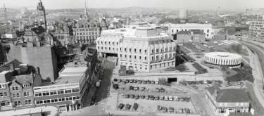 View of (centre) Town Hall extension (known as the Egg Box (Eggbox)), (centre right) Register Office, (top left) Town Hall and (bottom right) Yorkshire Grey public house No. 69 Charles Street