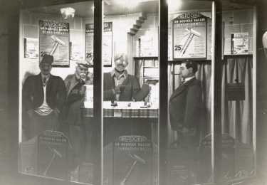 Shop window (possibly in Algeria) advertising 'Wardonia' safety razors manufactured by Thomas Ward and Sons Ltd., Wardonia Works