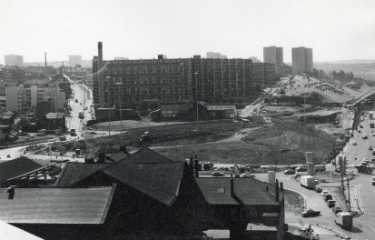 Construction of Park Hill roundabout showing (back) Park Hill flats and Claywood Flats, (left) Duke Street (right) Sheaf Street and Shukers of Sheffield Ltd., motor engineers and commercial motor body builders, South Street