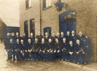 Probably a group of post office sorting office workers