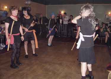 Sheffield City Morris dressed up in Sciorr the women's dance group's costumes
