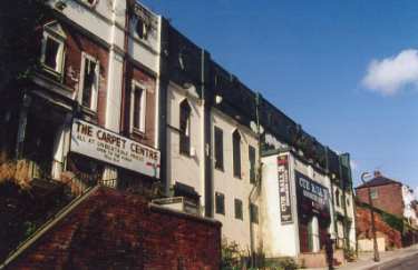 The Carpet Centre and Cue Ball 3 Snooker Club, No. 3 Idsworth Road (formerly Roxy Picture Theatre and Page Hall Cinema)