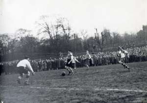 Hallam FC goalkeeper comes out to collect a pass back during a menacing raid during the Amateur League semi final, Sheffield Rover v. Hallam FC at the Waterworks ground, Crookes (Hadfields sports ground), [c. 1950]