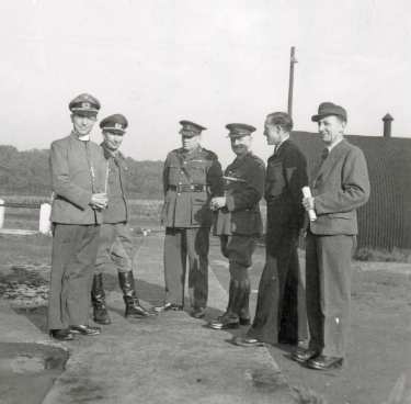 German prisoners of war and British military officers, probably Norton prisoner of war camp 174, Cuckney, near Mansfield, Nottinghamshire