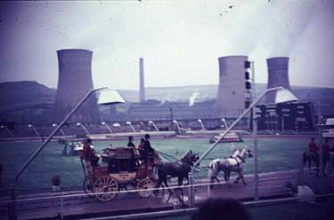 Horse drawn carriage, Owlerton Stadium showing (back) Neepsend Power Station