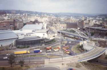 Park Square roundabout showing (left) Ponds Forge Sports and Leisure Centre, (centre) Supertram Bridge and Commercial Street and (right) Sheaf Market